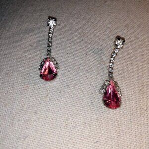 Rhinestone dangle pushback earrings with a pink stone.